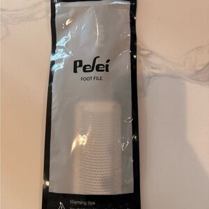 Black and White Foot Care Tool